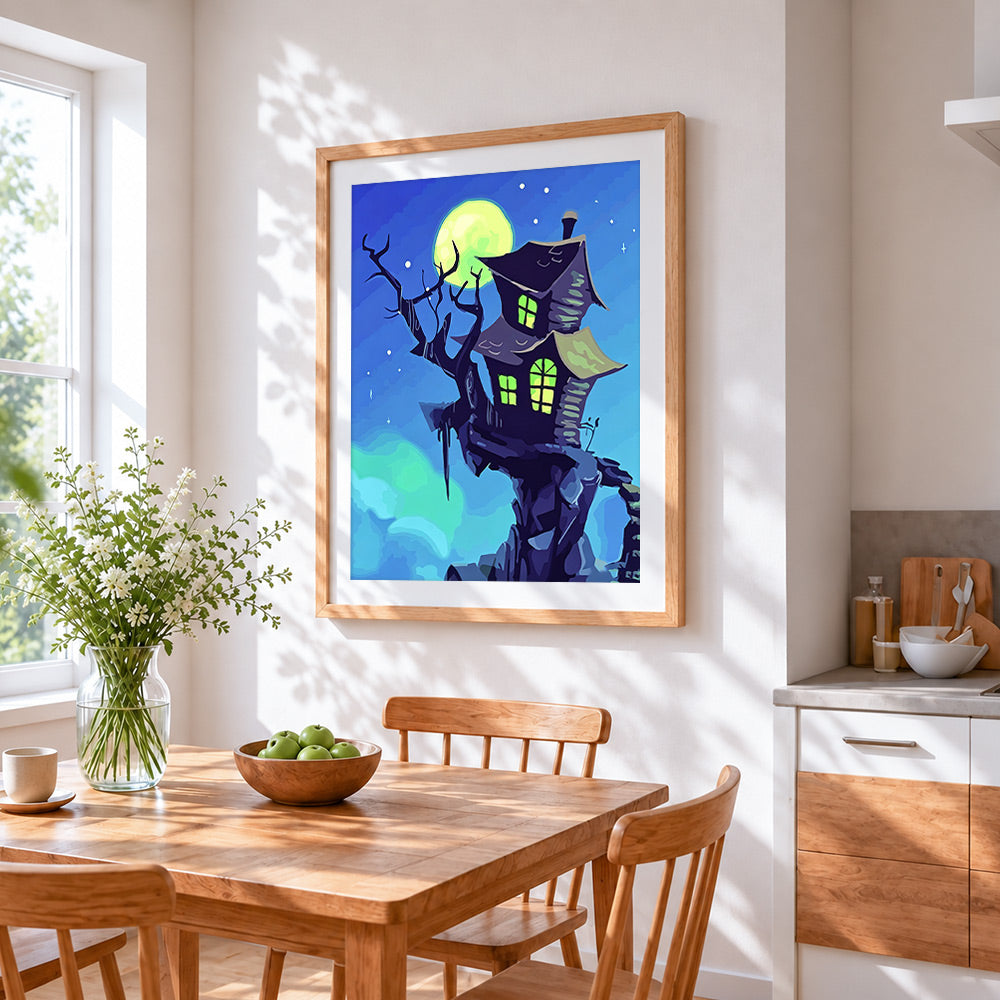 Moonlit haunted house cross stitch artwork displayed on wall as home decor