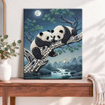 Finished moonlit panda pair pearl diamond painting artwork displayed as home decor