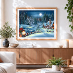 Finished moonlit snowy cottage with festive lanterns cross stitch artwork displayed