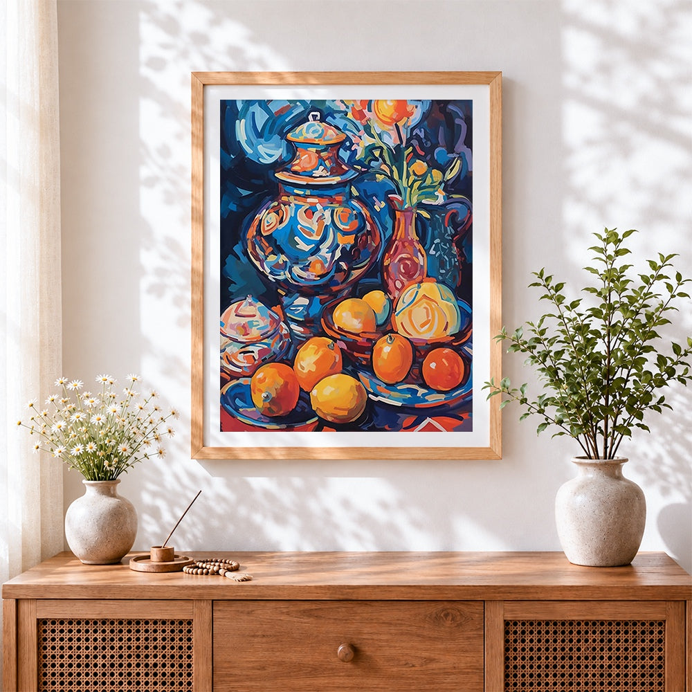 Finished moroccan pot and oranges cross stitch artwork displayed
