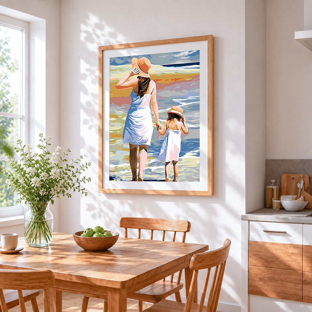 Mother and daughter walking to the sea cross stitch artwork displayed on wall as home decor