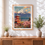 Finished mount fuji and pagoda cross stitch artwork displayed
