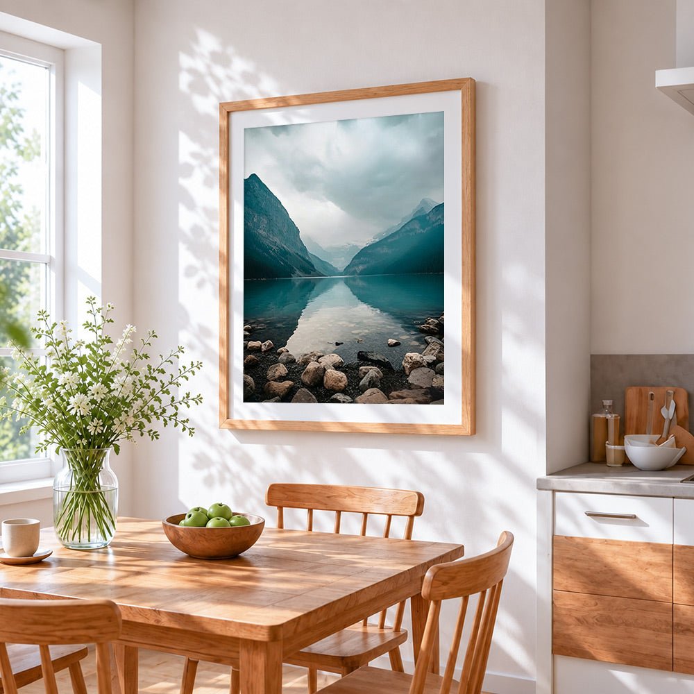 Mountain lake reflection cross stitch artwork displayed on wall as home decor