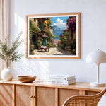 Mountain village and al fresco dining cross stitch artwork displayed on wall as home decor