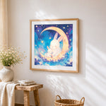 Mummy and baby bunny on the moon cross stitch artwork displayed on wall as home decor