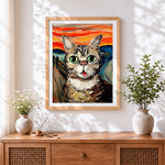 Finished munch style cat cross stitch artwork displayed