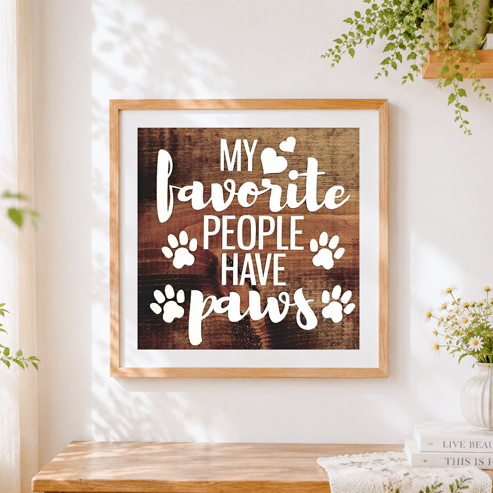 Finished my favourite people have paws cross stitch artwork displayed