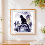 Finished mystical black cat in a graveyard cross stitch artwork displayed