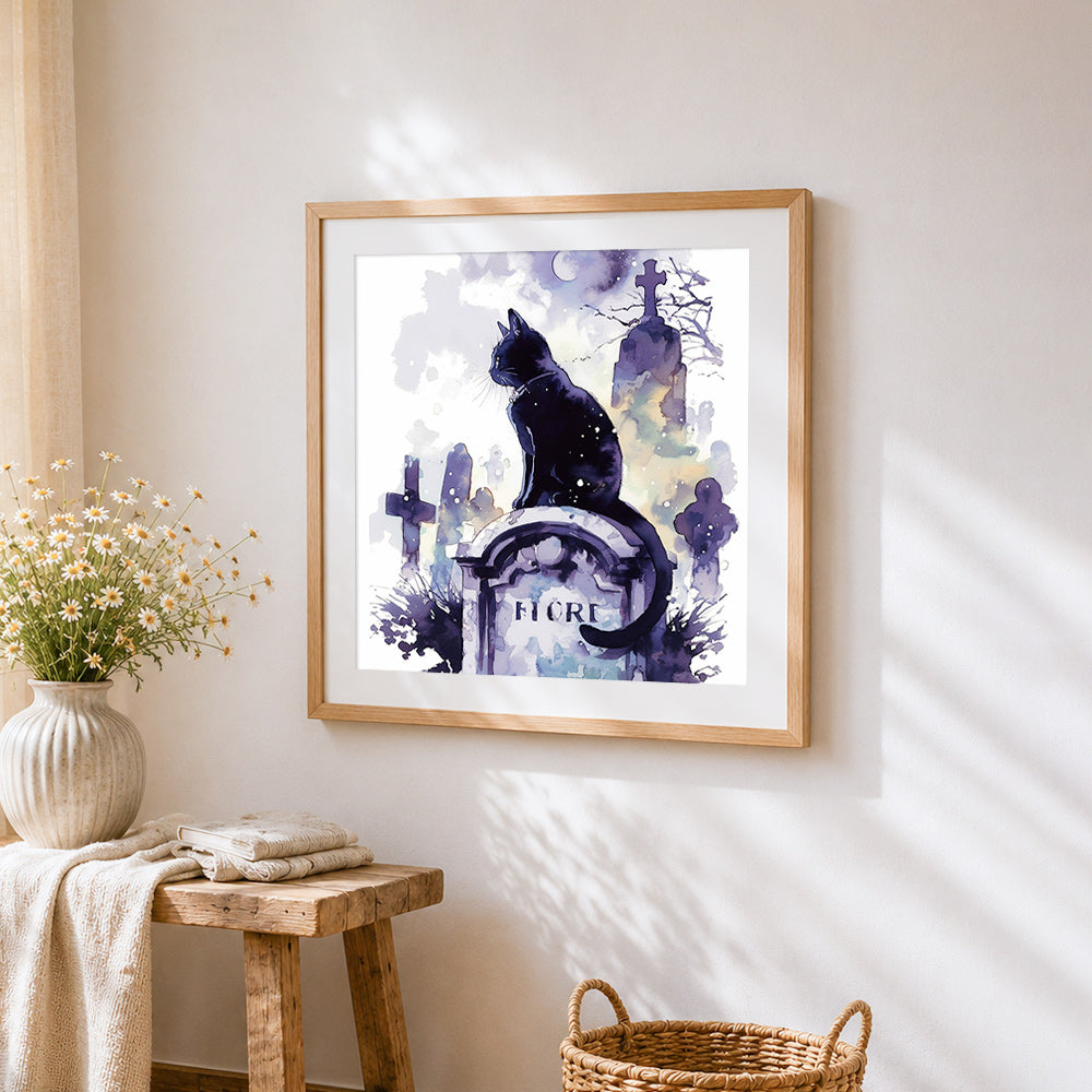 Mystical black cat in a graveyard cross stitch artwork displayed on wall as home decor