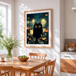 Mystical black cat with lanterns cross stitch artwork displayed on wall as home decor