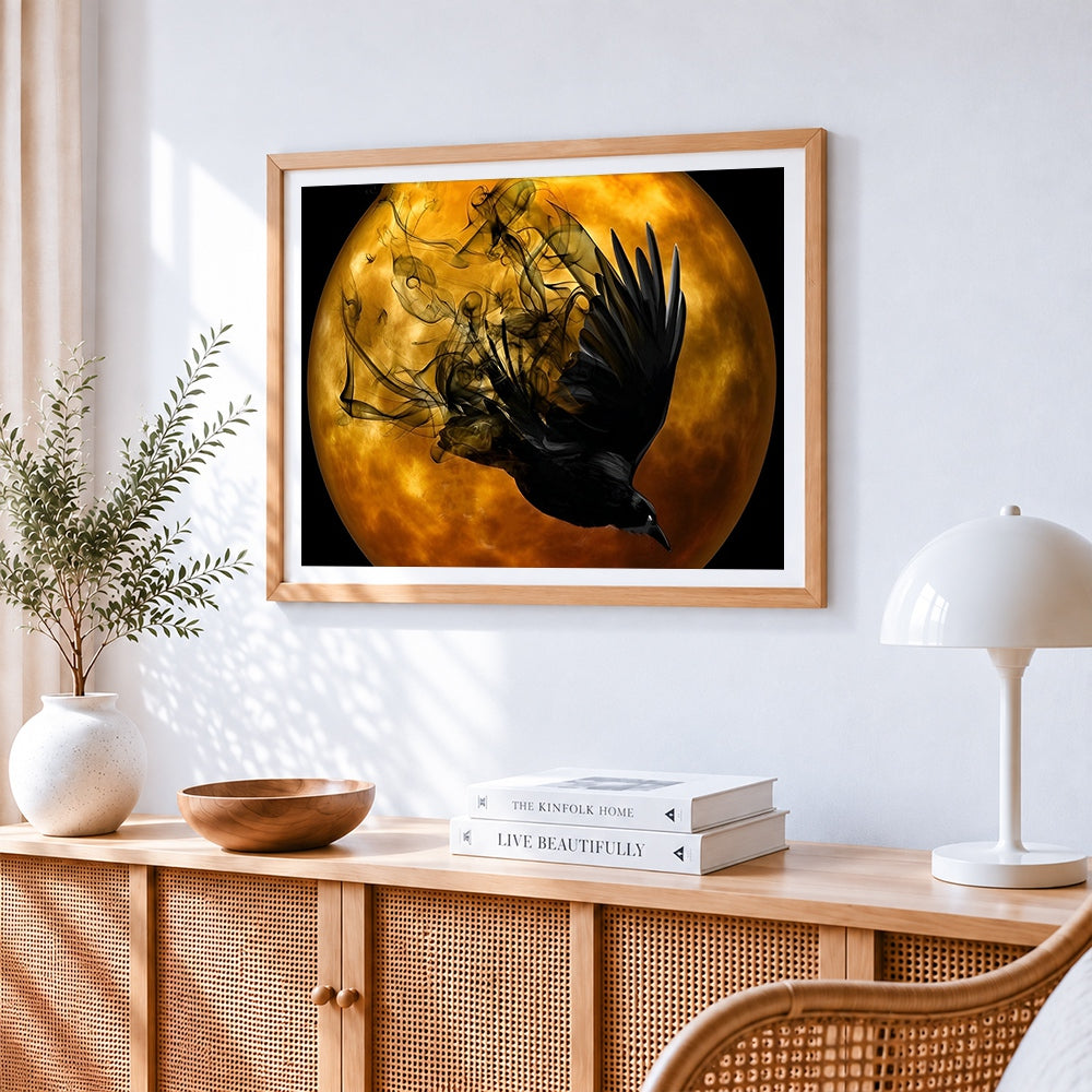 Mystical black raven and full moon cross stitch artwork displayed on wall as home decor