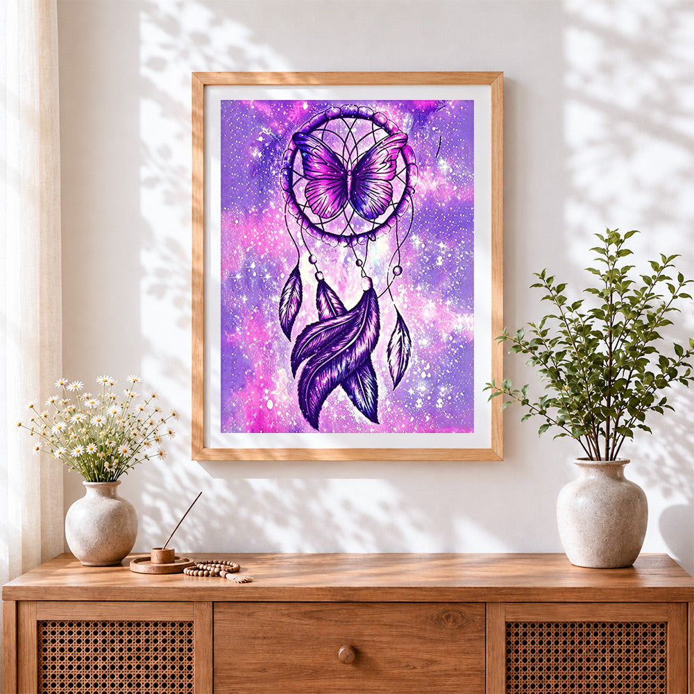 Finished mystical galaxy dreamcatcher with purple butterfly cross stitch artwork displayed