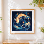 Finished mystical koi fish yin yang cross stitch artwork displayed