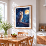 Mystical owl perched under a full moon cross stitch artwork displayed on wall as home decor
