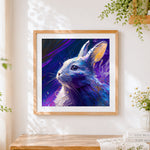 Finished mystical purple oil painting rabbit cross stitch artwork displayed