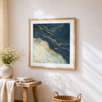 Navy blue and gold marble texture cross stitch artwork displayed on wall as home decor