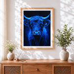 Finished neon blue highland cow paint by numbers artwork displayed as home decor