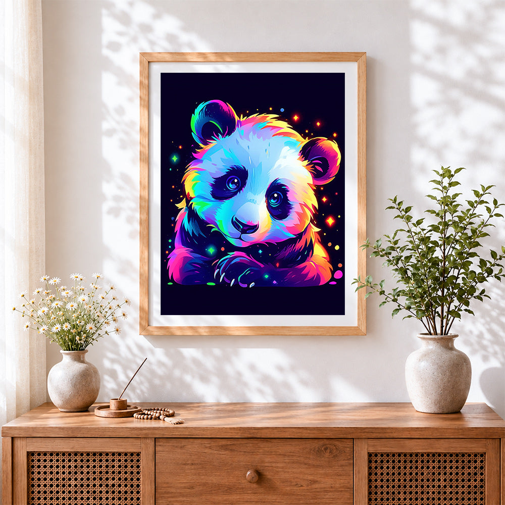 Finished neon galaxy panda cross stitch artwork displayed