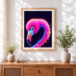 Finished neon glowing flamingo cross stitch artwork displayed