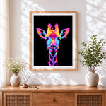 Finished neon glowing giraffe cross stitch artwork displayed