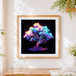 Finished neon glowing tree of life cross stitch artwork displayed
