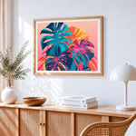 Neon monstera leaves paint by numbers artwork displayed on wall as home decor