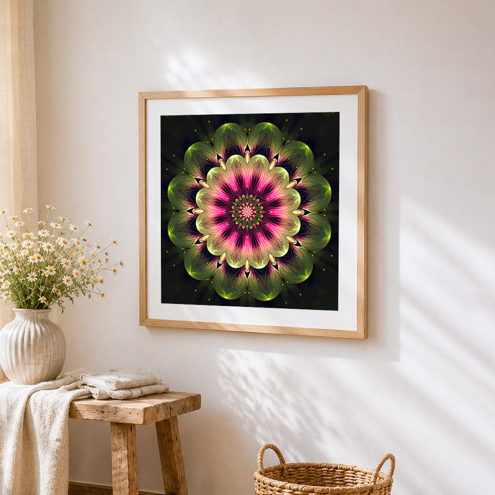 Neon pink and green kaleidoscope mandala cross stitch artwork displayed on wall as home decor