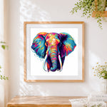 Finished neon pop art elephant close-up cross stitch artwork displayed