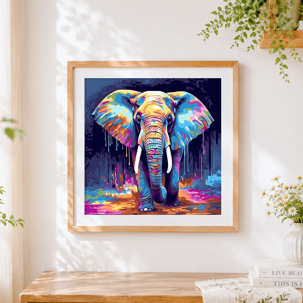 Finished neon pop art elephant cross stitch artwork displayed
