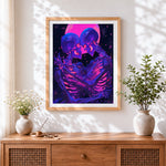 Finished neon skeleton lovers cross stitch artwork displayed