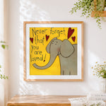 Finished "never forget that you are loved" elephant cross stitch artwork displayed