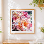 Finished oil painting style pink peonies cross stitch artwork displayed