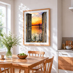 Open doors to a sunset lake and birds paint by numbers artwork displayed on wall as home decor