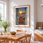Open doors to the ocean at sunset cross stitch artwork displayed on wall as home decor