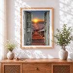 Finished open doors to the ocean at sunset paint by numbers artwork displayed as home decor