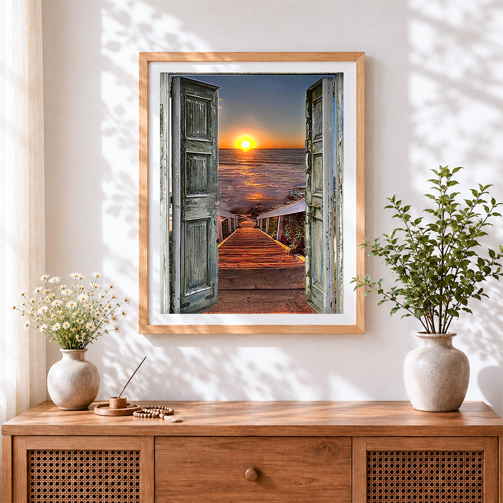 Finished open doors to the ocean at sunset paint by numbers artwork displayed as home decor