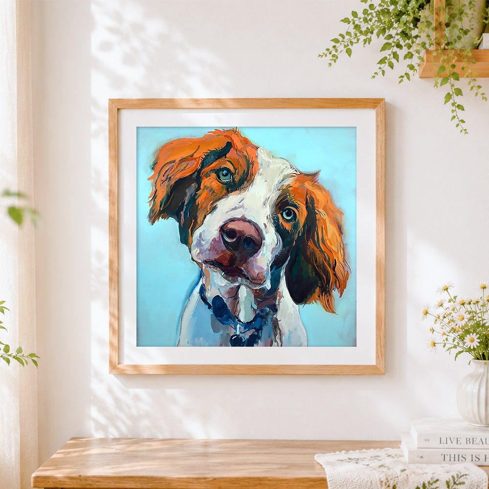 Finished orange and white hunting dog cross stitch artwork displayed