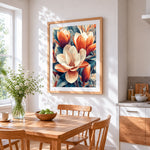 Orange and white magnolias cross stitch artwork displayed on wall as home decor