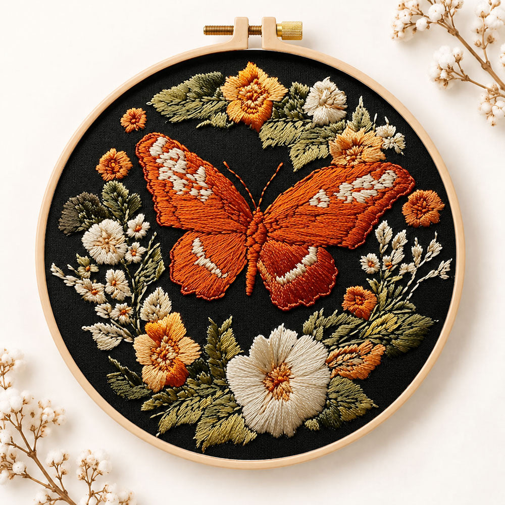 Orange butterfly amid blooms embroidery kit