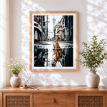 Finished orange cat and tiger reflection cross stitch artwork displayed