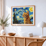 Orange cat in van gogh's starry night cross stitch artwork displayed on wall as home decor