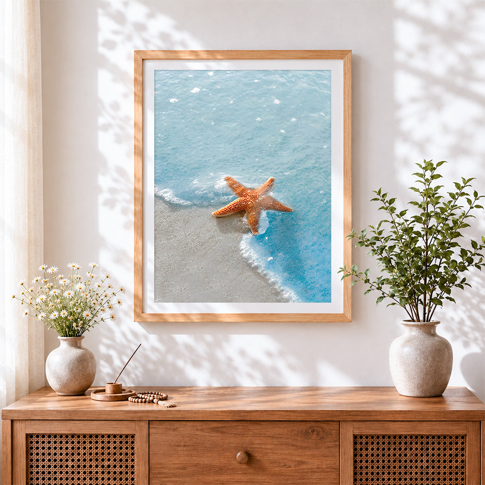 Finished orange starfish in ocean waves paint by numbers artwork displayed as home decor