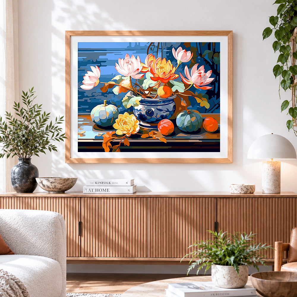Finished oriental blue and white vase pumpkins and lotus cross stitch artwork displayed