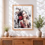 Finished oriental woman with tattoos and flowers cross stitch artwork displayed