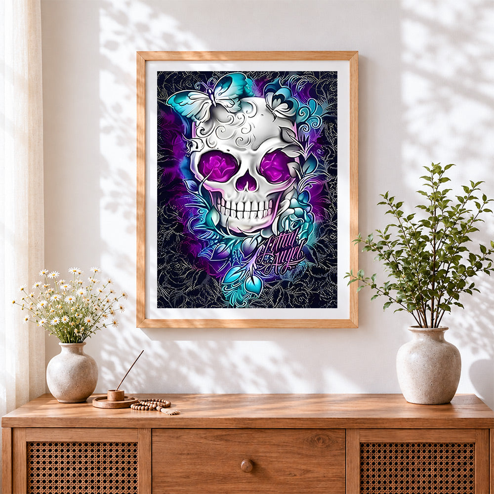 Finished ornate white skull with purple eyes cross stitch artwork displayed