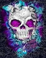 Ornate white skull with purple eyes cross stitch kit for beginners