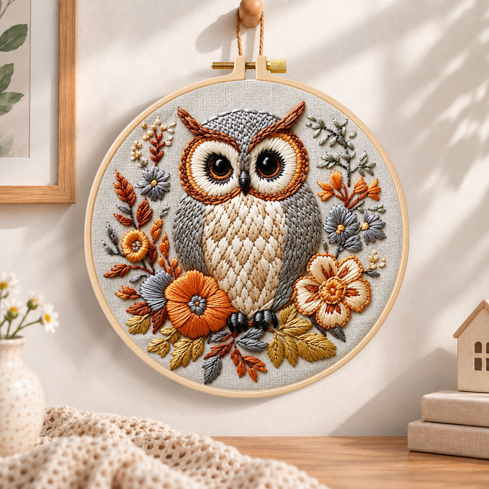 Owl among autumn blooms embroidery hoop wall art displayed as warm and cosy handmade home decor