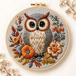 Owl among autumn blooms embroidery kit