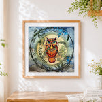 Finished owl among the vines cross stitch artwork displayed