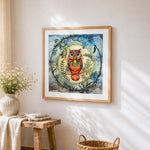 Owl among the vines cross stitch artwork displayed on wall as home decor